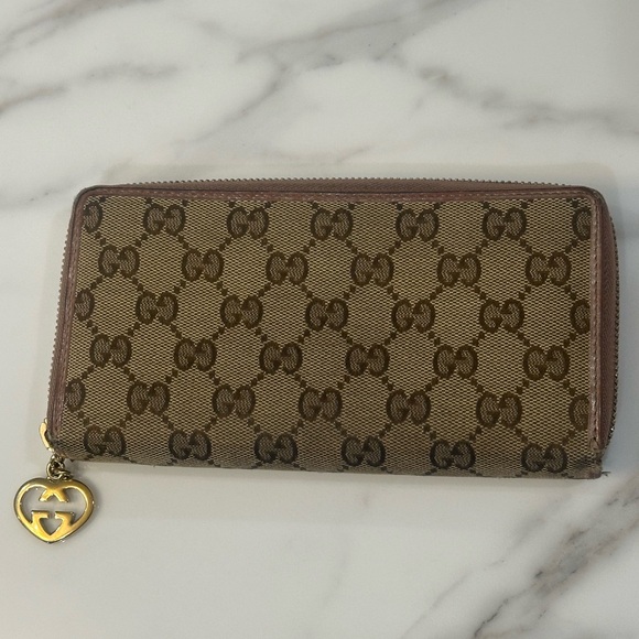 Gucci Handbags - Gucci Brown Monogram Continental Wallet with Gold Charm